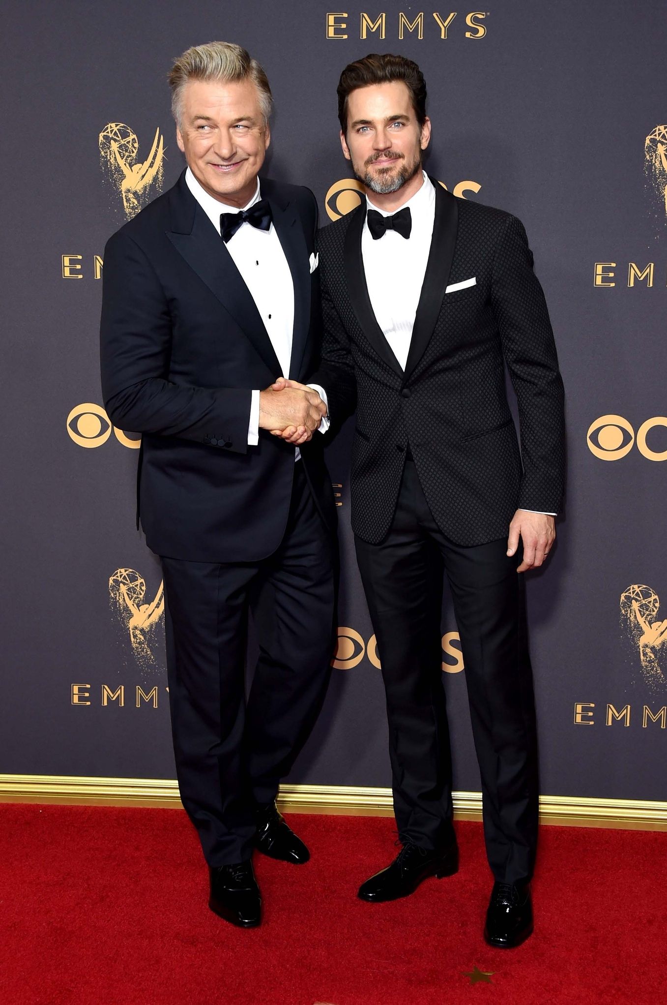 ALEC BALDWIN AND MATT BOMER In Ermenegildo Zegna Made to Measure (Baldwin) and Giorgio Armani (Bomer) at the Emmys